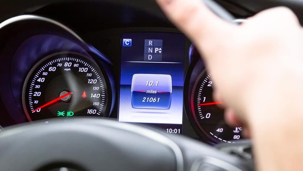 Find and note the locations of buttons with the up, down, and “OK” on your steering wheel. These buttons control what’s displayed at the center of your screen.
