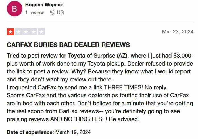 An image highlighting a bad customer review for Carfax on the TrustPilot platform